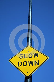 Slow down sign