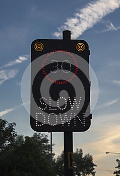 Slow down sign