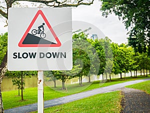 Slow Down Sign For Way Down in a Park