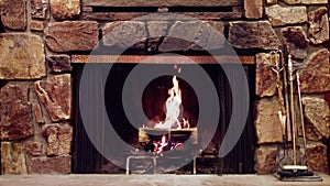 slow motion beautiful fireplace vintage poker logs crackle in cozy house