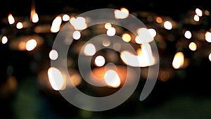 Slow-motion candlelight bokeh and blur candles background