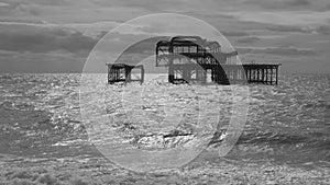 Slow motion clip of west pier ruins at brighton beach