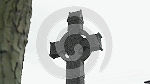 Slow-motion closeup of an old Irish Celtic cross in Athlone, Ireland