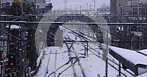 A slow motion of falling snow at the station in Tokyo