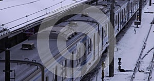 A slow motion of falling snow at the station in Tokyo