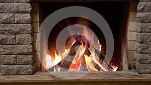 Slow motion fire in the fireplace in country house.