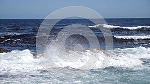 Slow motion footage of wave breaking on Rocky cliffs, Cape Peninsula, Cape Town