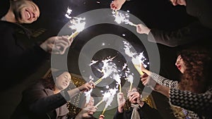 SLOW MOTION: Friends with sparklers dancing