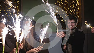 SLOW MOTION: Friends with sparklers dancing