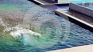 Slow motion girl to fall in water in swimming pool