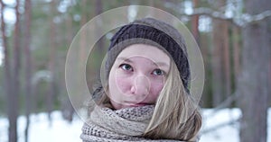 slow motion handheld of teenage girl portrait ikn winter forest