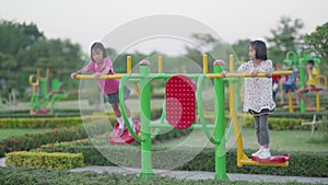 Slow motion kids running and playing in playground