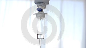 Slow Motion with a Medical Perfusion Dripping the Anesthetic for an Intravenous Treatment