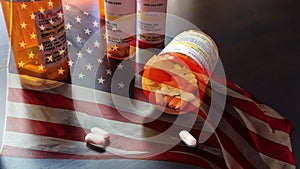 Slow Motion Medicine Bottles and Pills Falling With Ghosted American Flag Waving