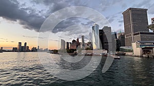 Slow motion of New York city skyline at sunset from Staten Island Ferry