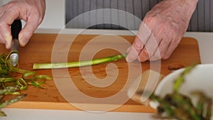 Slow motion of peeling asparagus