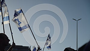 Slow motion of protestors demonstrating with Israel national flags