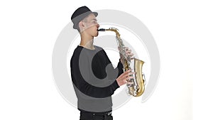 Slow motion. Saxophonist plays a tune on the sax