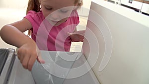 Slow Motion Sequence Of Girl Recycling Kitchen Waste In Bin