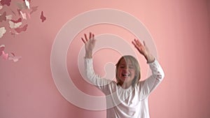 Slow Motion Sequence Of Young Girl Jumping On Her Bed