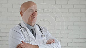 Slow motion with serious doctor waiting in a confident position