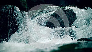 Slow motion shot of an Alpine whitewater waterfall near Grenoble, France