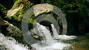 Slow motion shot of an Alpine whitewater waterfall near Grenoble, France