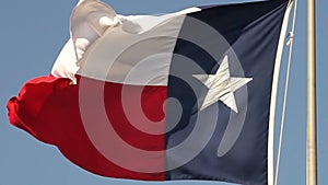 Slow motion Texas flag blowing in wind