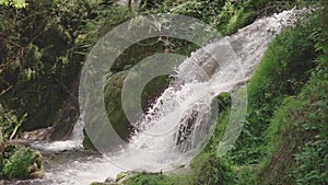 Slow motion of waterfall in forest