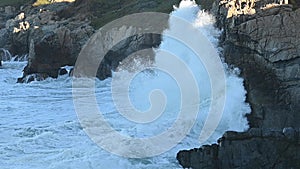 Slow Motion of Waves Crashing into Rocky California Coast