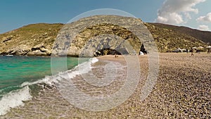 Slow motion of Zorkos Beach in Andros island in Greece. A beautiful touristic destination.