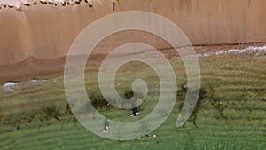 Slow moving along the wave view at the clear crystal seawater shoreline