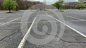 Slow pass through an empty parking lot.