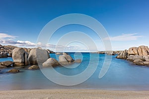 Rocky coastline and sandy beach at Cavallo island near Corsica
