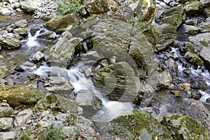 The slow shutter of small stream on the stone of sanqingshan mountain scenic area, adobe rgb