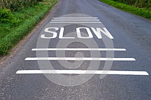 Slow Sign freshly painted on road