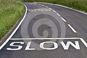 Slow signs on the road