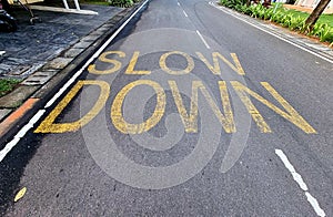 Slower driving sign photo