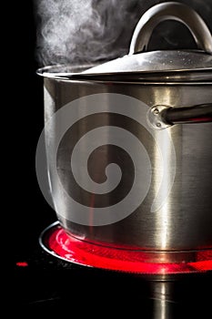 Slowfood - Lovely homemade dish being prepared in steaming pot