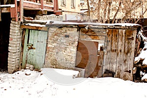 Slums, old, warped, cracked buildings, storage sheds, outdoor storage rooms