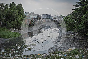 Slums by a river in Ho Chi Minh City, Vietnam.