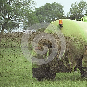 Slurry spreading in a field, England, United Kingdom photo