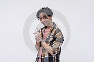 A sly and devious asian man making a business proposal, feeling cocky and cracking his knuckles. Isolated on a white background