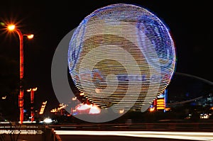 SM Mall of Asia (MOA) Globe and blurry night traffic lights