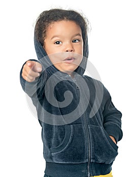 Small afroamerican girl pointing at the camera