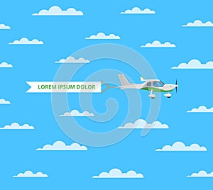 Small aircraft with banner in sky