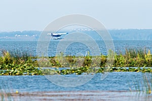 Small aircraft landing in the bay