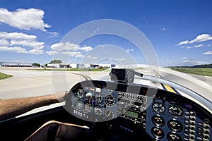 Small aircraft taking off from runway