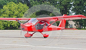 Small airplane in dirt airfield