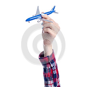 Small airplane in hand